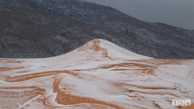 В крупнейшей пустыне Сахара выпал снег